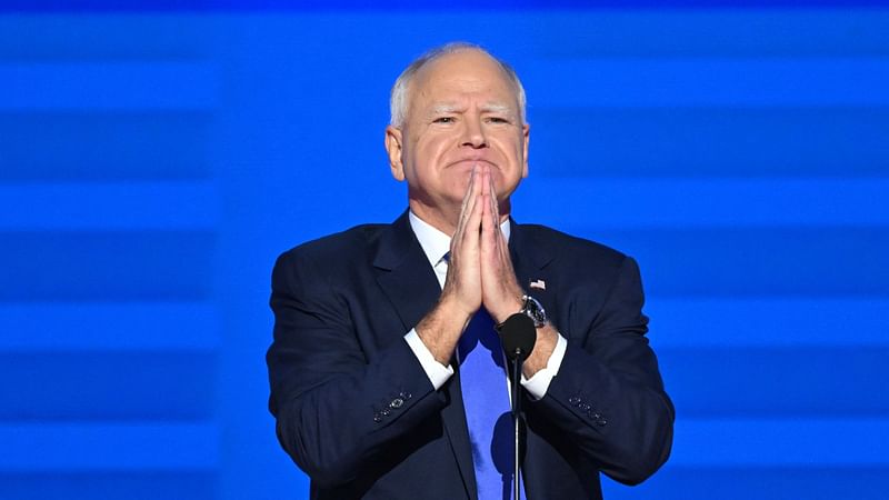 Minnesota Governor and Democratic vice presidential candidate Tim Walz gestures as he concludes his remarks on the third day of the Democratic National Convention (DNC) at the United Center in Chicago, Illinois, on 21 August 2024